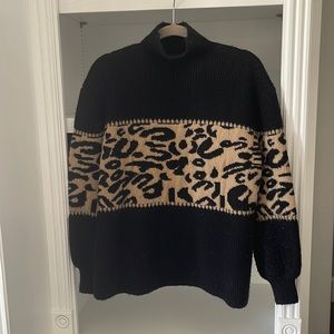 Turtleneck Sweater with animal print accent